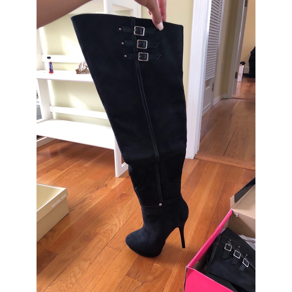 Thigh high heeled boots